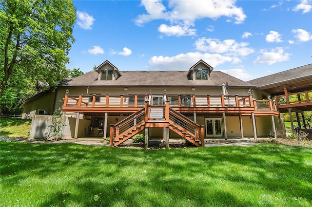 rear view of house featuring a patio, a yard, and a deck