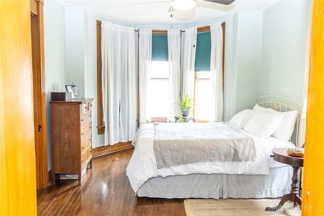 bedroom featuring ceiling fan and hardwood / wood-style floors