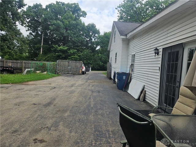 view of patio featuring fence