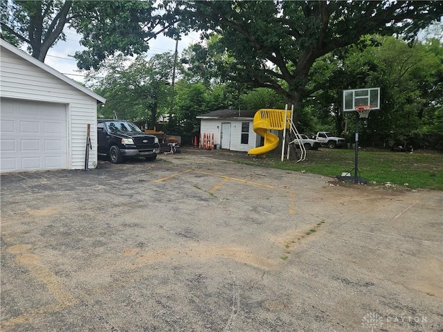 garage featuring uncovered parking