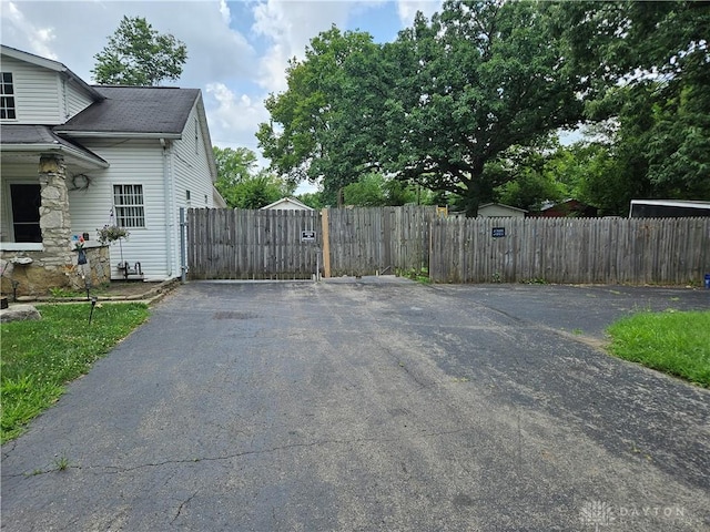 exterior space featuring a gate