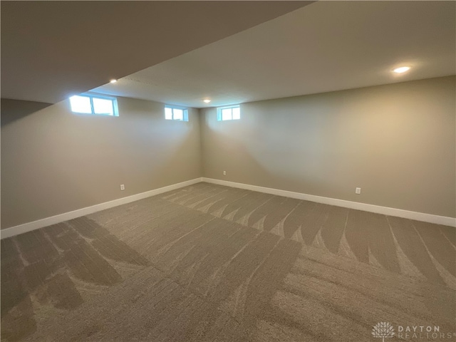 basement with carpet and a wealth of natural light