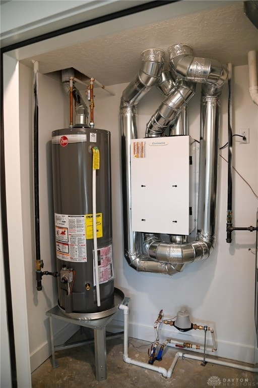 utility room with gas water heater