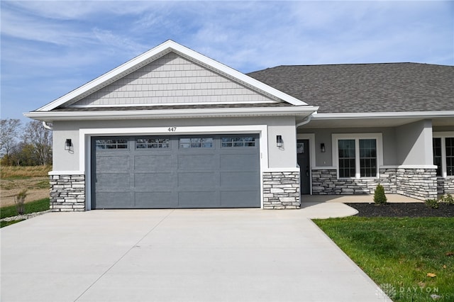 craftsman-style home featuring a garage