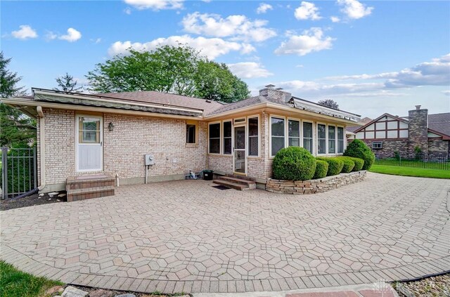 back of house featuring a patio