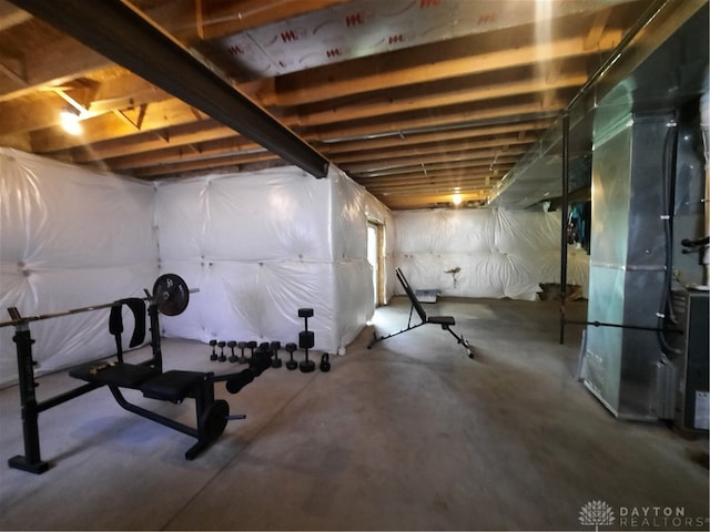 workout area featuring concrete floors