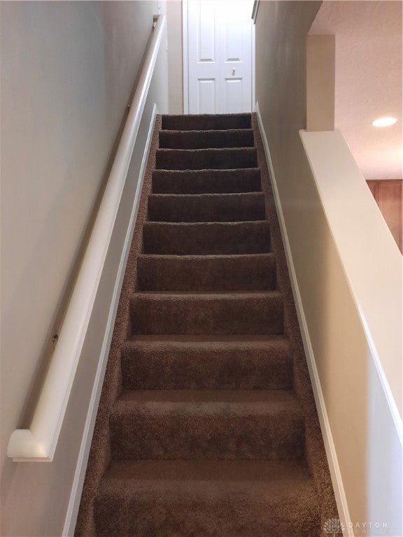 stairs with carpet floors