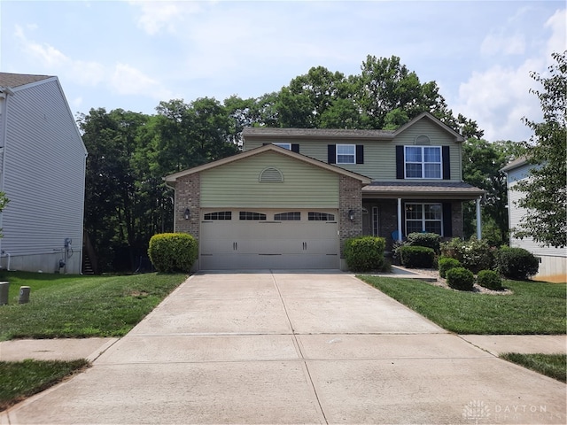 front of property featuring a garage and a front yard