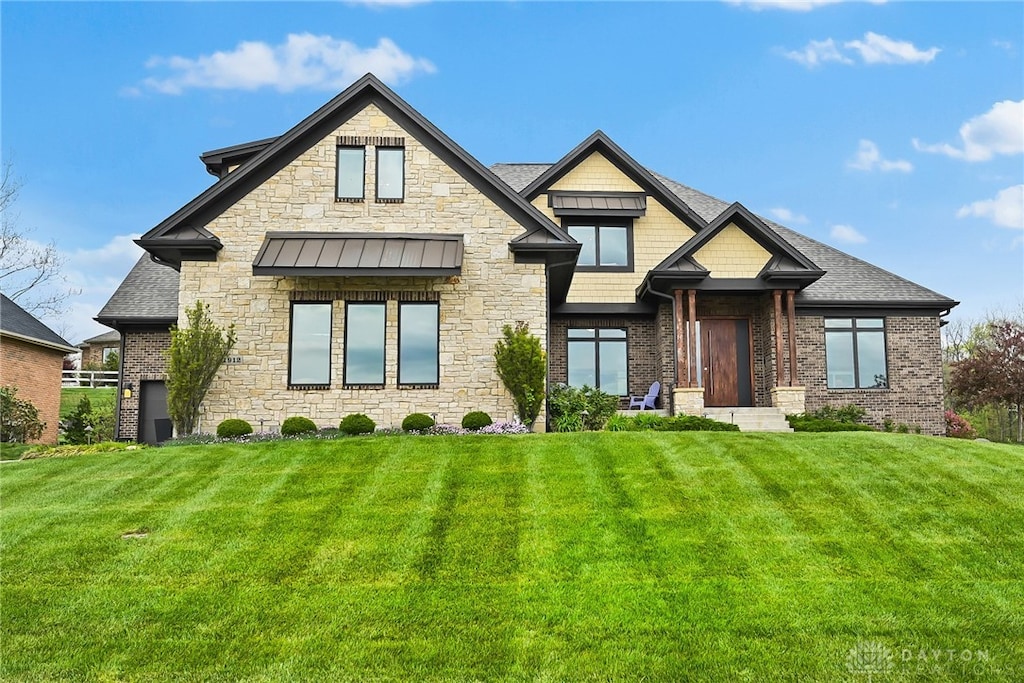 view of front of property with a front lawn