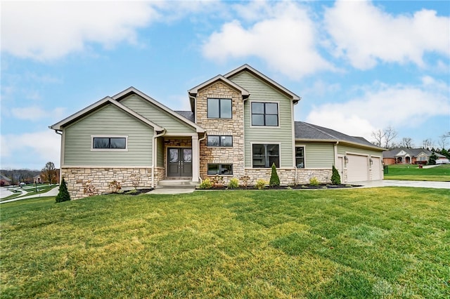 craftsman inspired home with a garage and a front yard