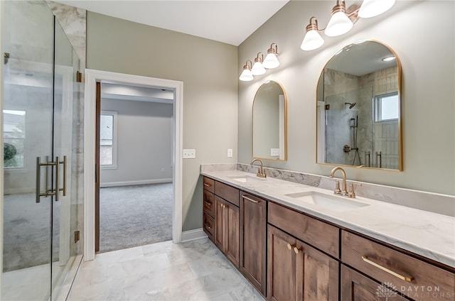 bathroom with vanity and an enclosed shower