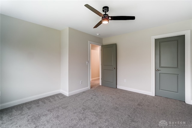 unfurnished bedroom with carpet flooring and ceiling fan