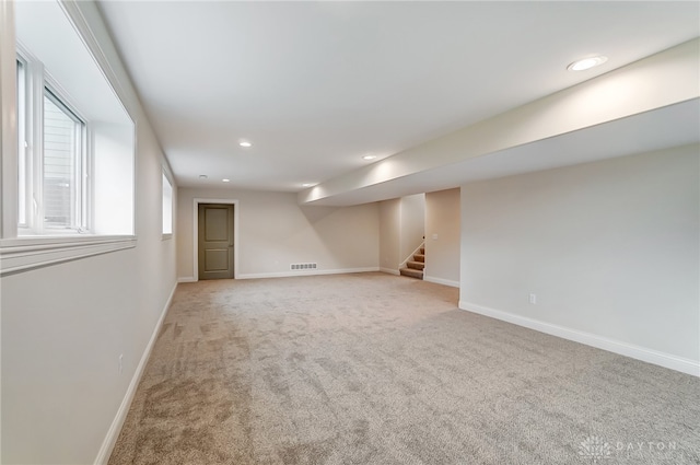 basement featuring carpet flooring