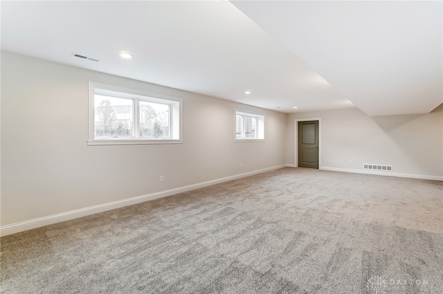 basement with carpet flooring