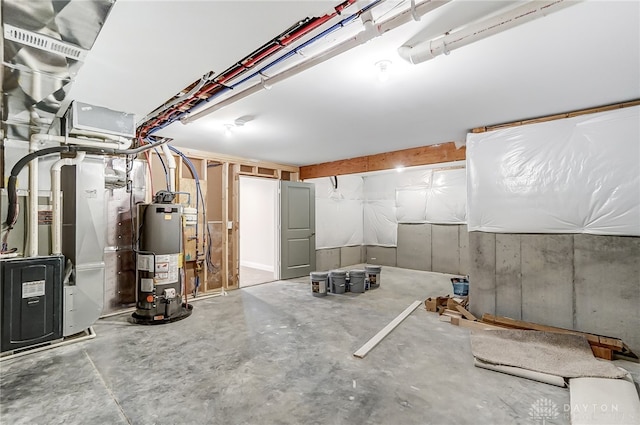 basement with heating unit and water heater