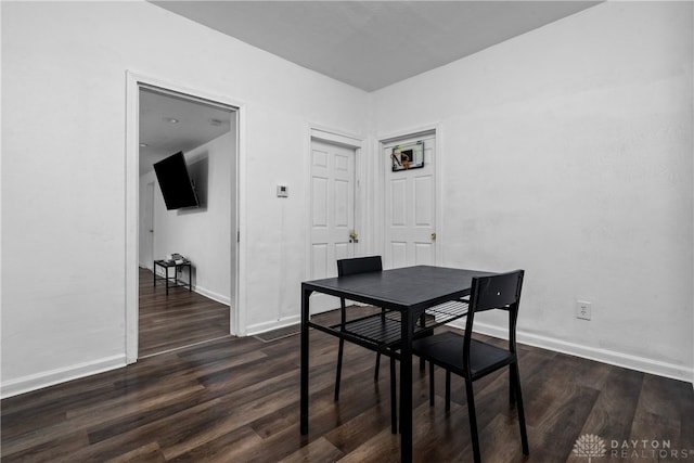 dining room featuring dark hardwood / wood-style floors