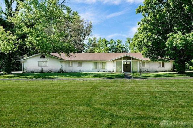 ranch-style home with a front yard