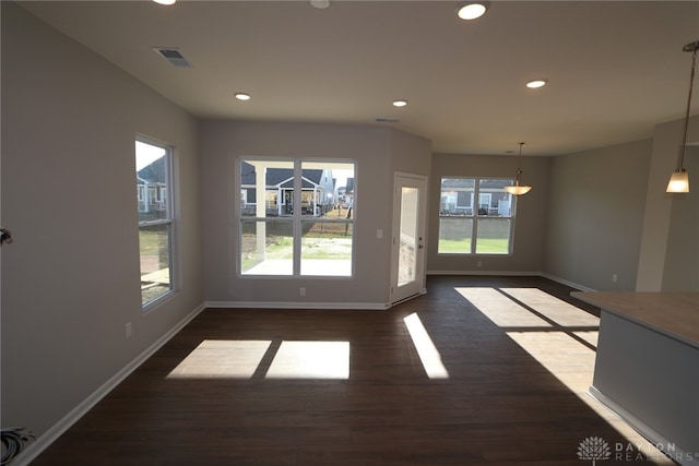 entryway with dark wood-type flooring