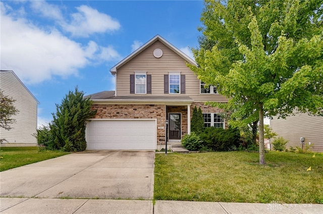 view of property with a front lawn and a garage