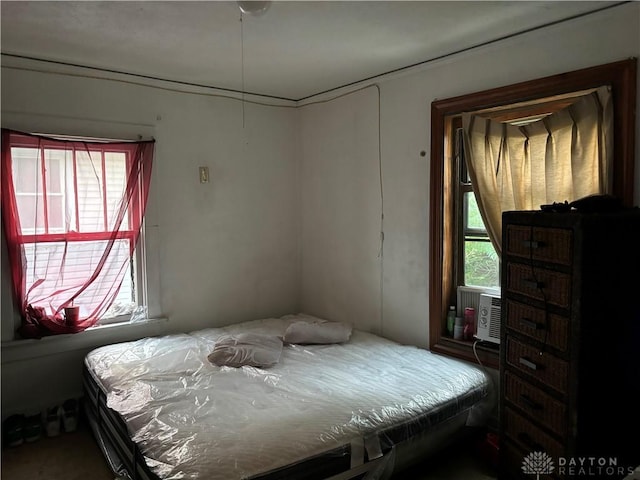 bedroom with cooling unit