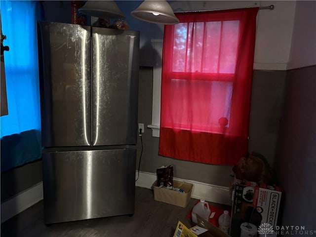 kitchen featuring freestanding refrigerator