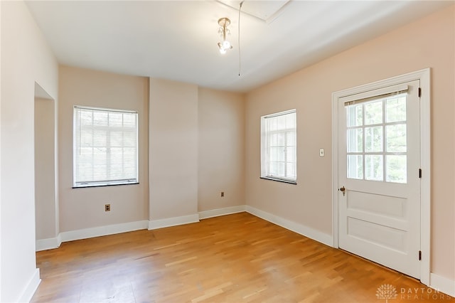 entryway with light hardwood / wood-style flooring