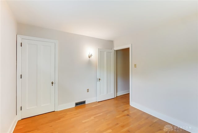 empty room featuring light hardwood / wood-style flooring