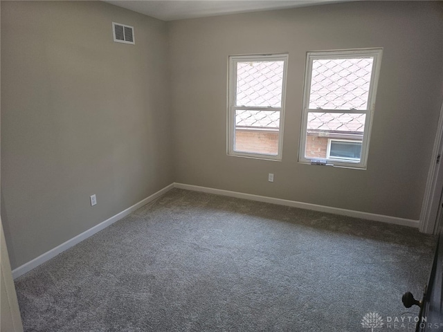 empty room featuring carpet