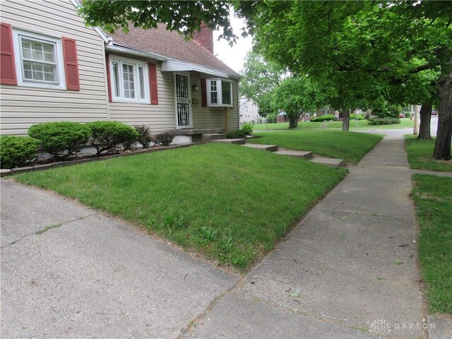 exterior space featuring a front yard