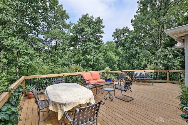 wooden deck with outdoor lounge area