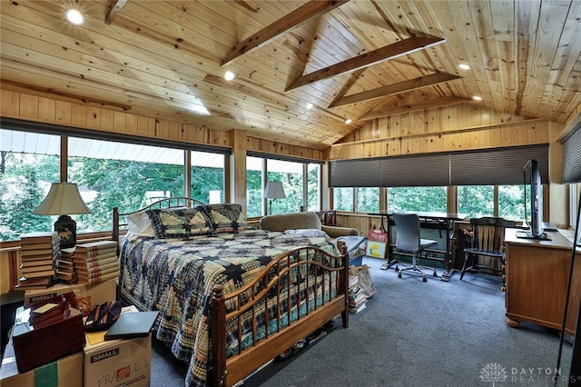 bedroom featuring dark carpet, wooden ceiling, and wood walls