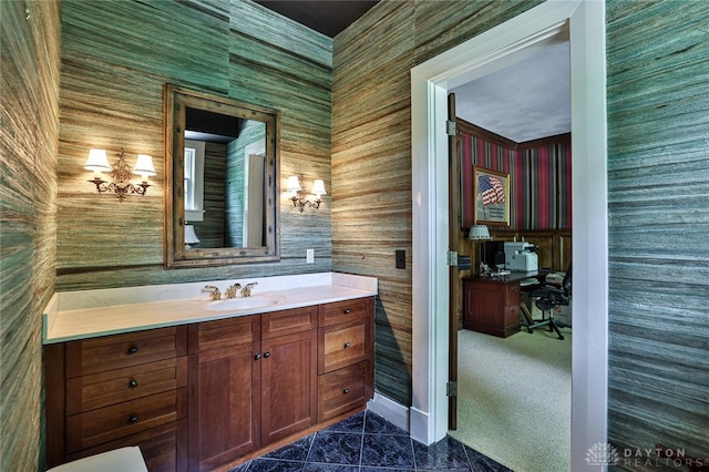 bathroom with tile patterned flooring and vanity