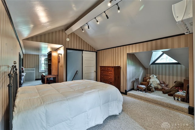 bedroom with carpet, vaulted ceiling, and multiple windows