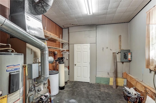 utility room with water heater and electric panel