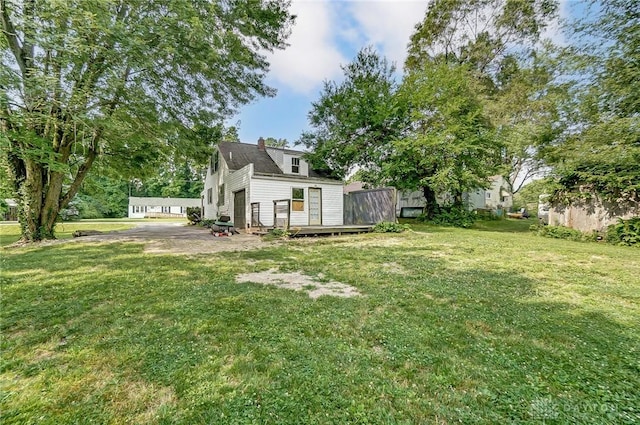 view of yard featuring a wooden deck