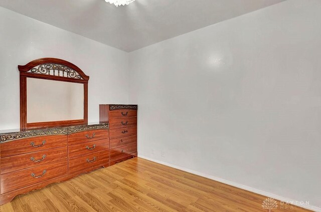 unfurnished bedroom featuring light hardwood / wood-style flooring