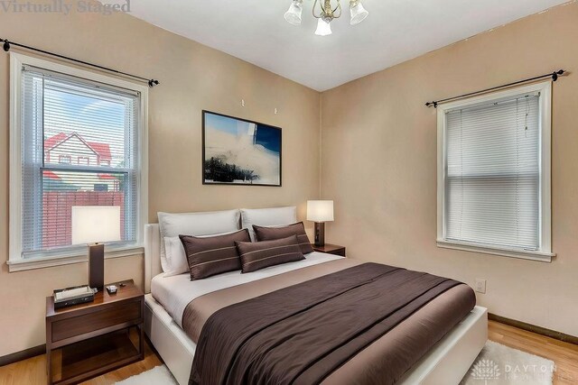 bedroom with light wood-type flooring