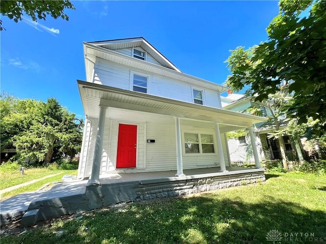 49 Pointview Ave, Dayton, OH 45405 - american foursquare style home with a porch and a front lawn