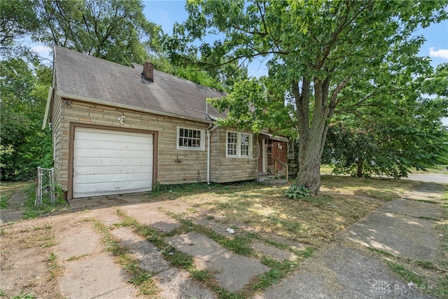 exterior space featuring a garage