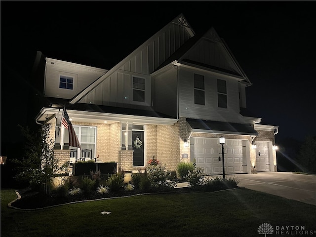 craftsman-style home with covered porch and a garage