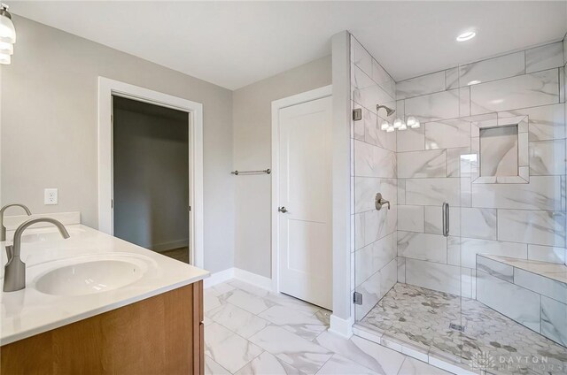 bathroom with vanity and an enclosed shower