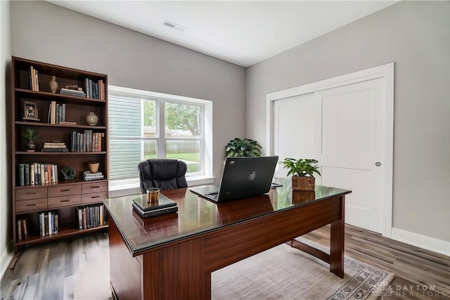 office with hardwood / wood-style floors