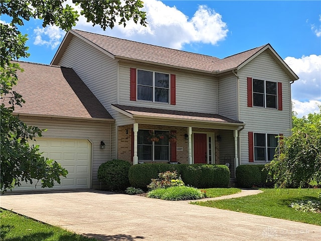 view of property featuring a garage