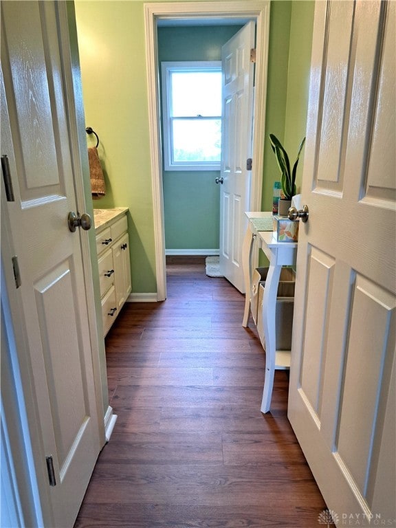 bathroom featuring vanity and hardwood / wood-style floors