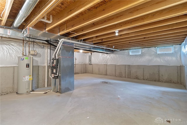 basement with heating unit and water heater