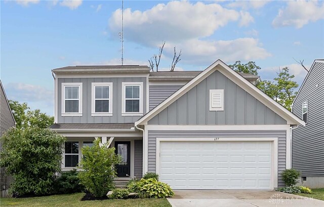 view of front of home with a garage