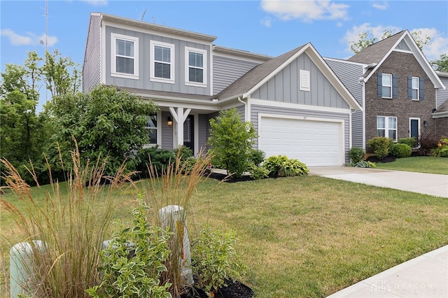 view of front facade with a garage and a front yard