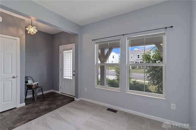 tiled foyer with plenty of natural light