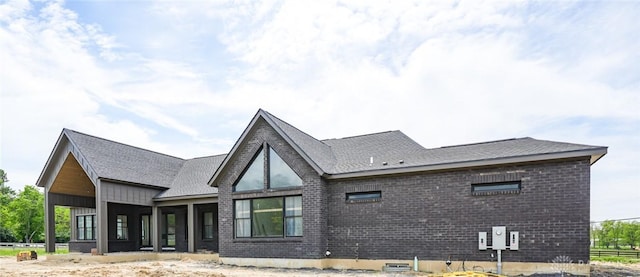 4870 Bunnell Hill Rd, Lebanon, OH 45036 - back of property featuring brick siding and a shingled roof