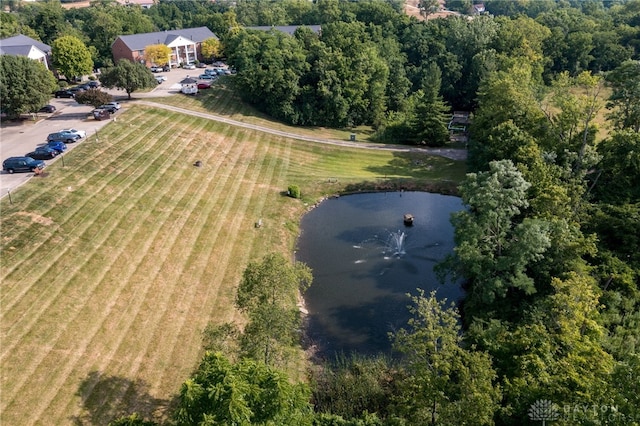 drone / aerial view with a rural view and a water view